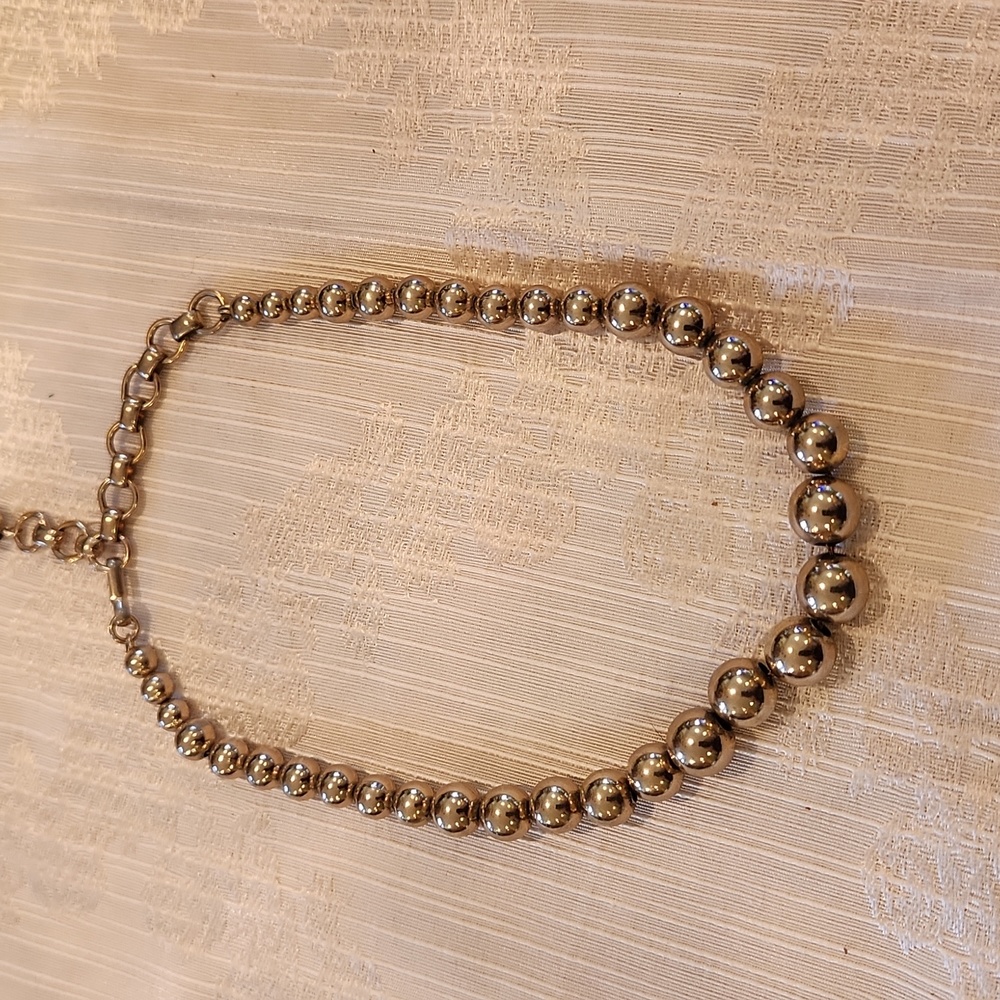 Gold tone necklace adjustable length